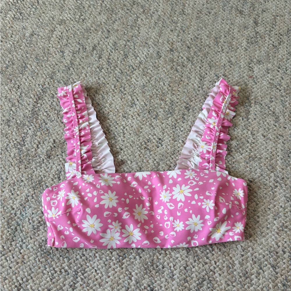 woman’s floral swimsuit top